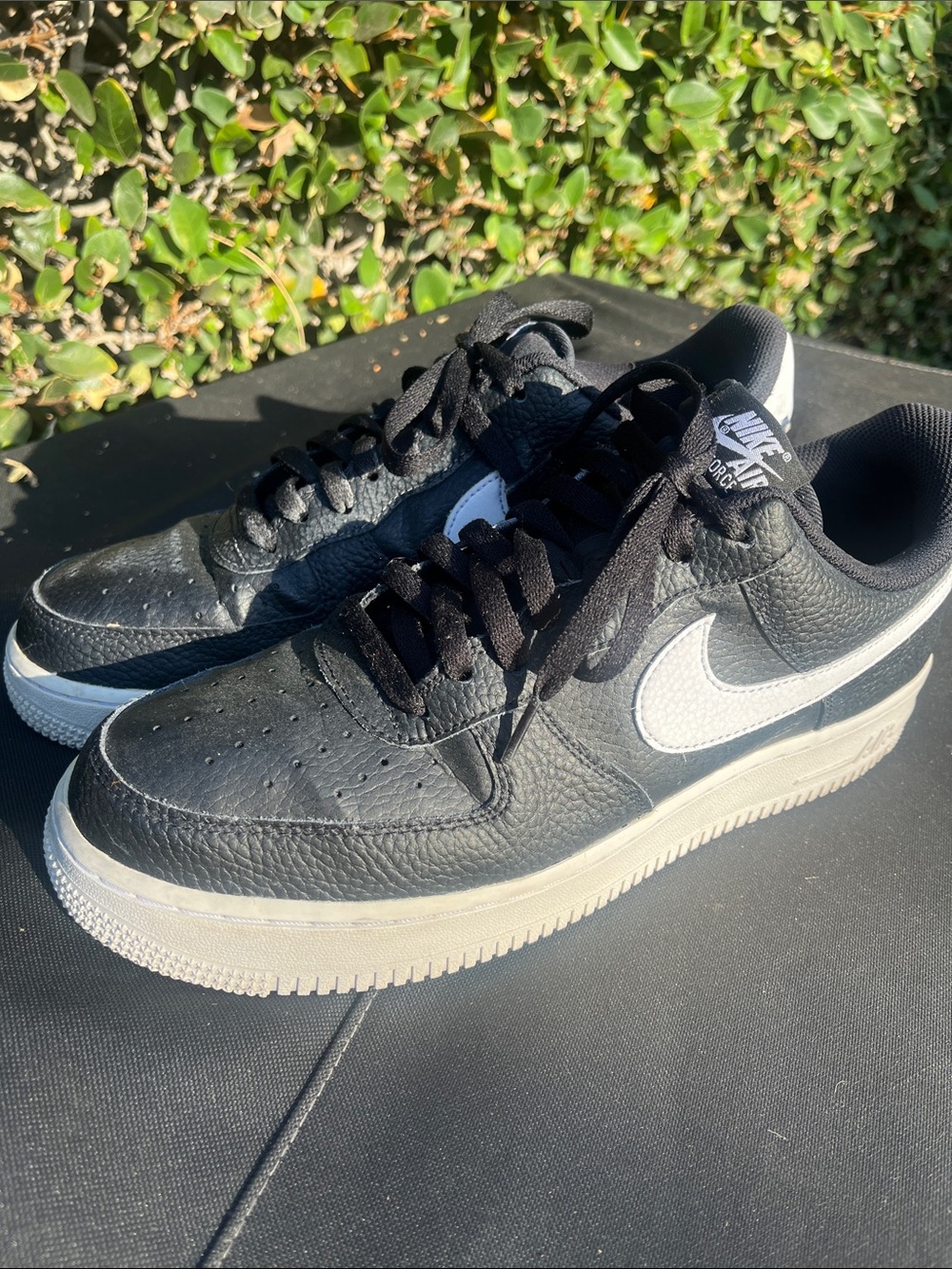 Nike Black Leather Sneakers with White Swoosh
